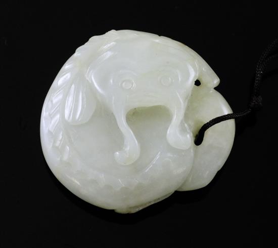 A Chinese pale celadon jade carving of a mud fish, 4.5cm